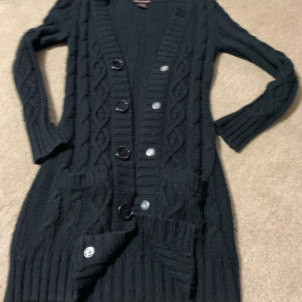 Thigh length black sweater